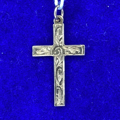 873 - 9ct gold cross pendant 1.2 grams