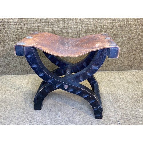 1186 - Wooden and leather topped folding milking stool.