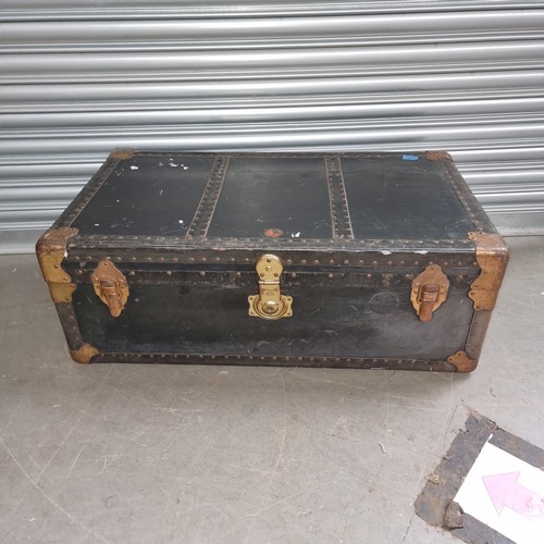 1220 - Large steamer trunk.