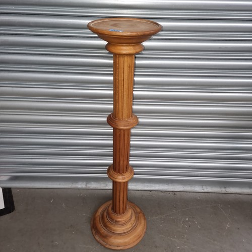 1221 - Two large solid wood tall standing plant stands.