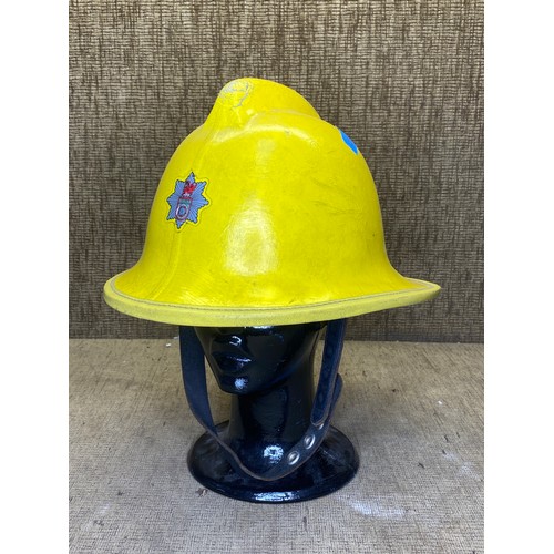 1210 - 1980s fire fighters helmet.