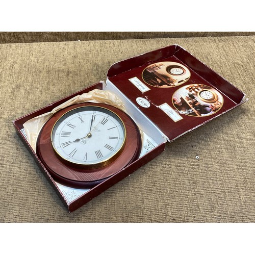 1238 - Boxed The Belgravia Quartz wall clock.