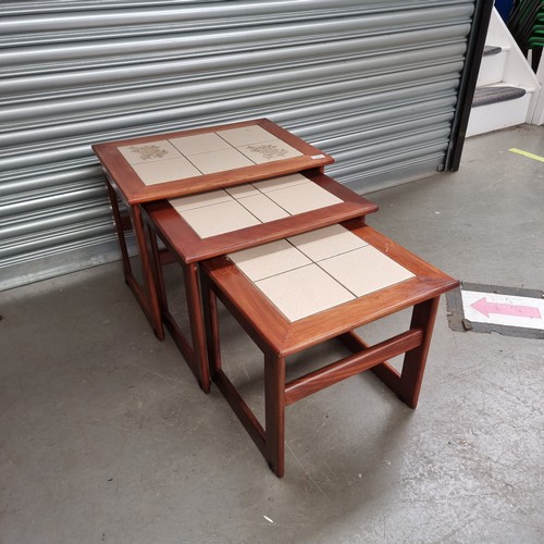 1222A - Wooden and marble topped nest of tables.