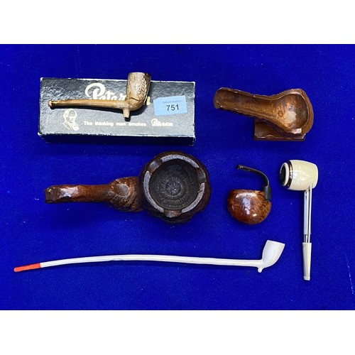 751 - Collection of antique smoking pipes.