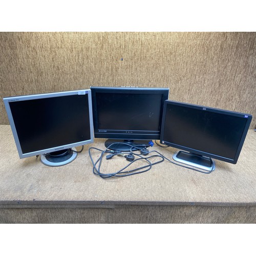 243 - 192 LCD TV with DVD player, Samsung monitor and HP Monitor.