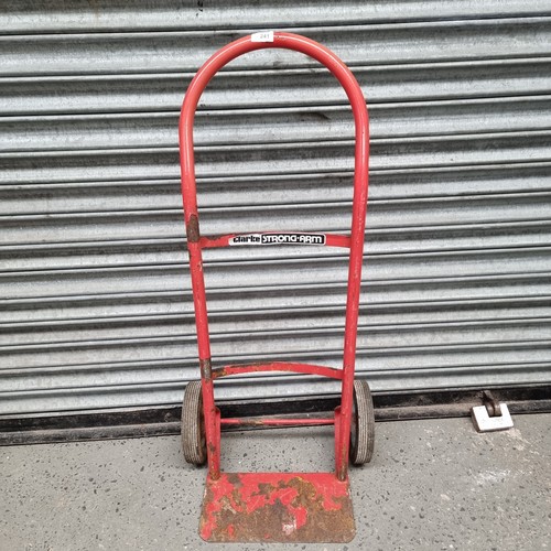 241 - Red sack truck.