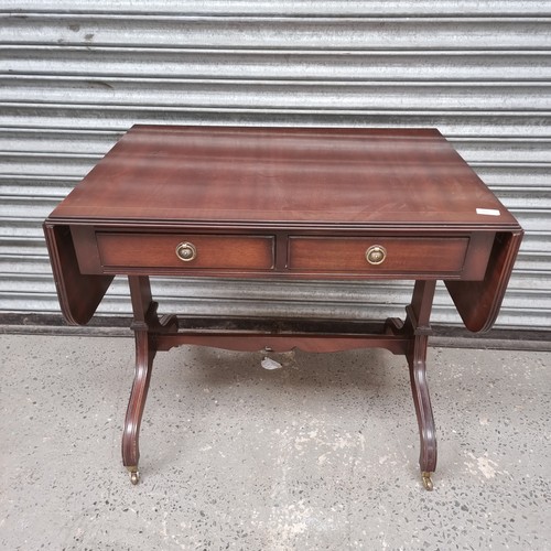 1232A - Vintage mahogany drop leaf table.