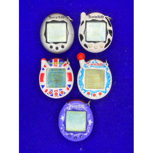 761 - 5 2004 Bandai Tamagotchi ( 4 /5 in working order ).