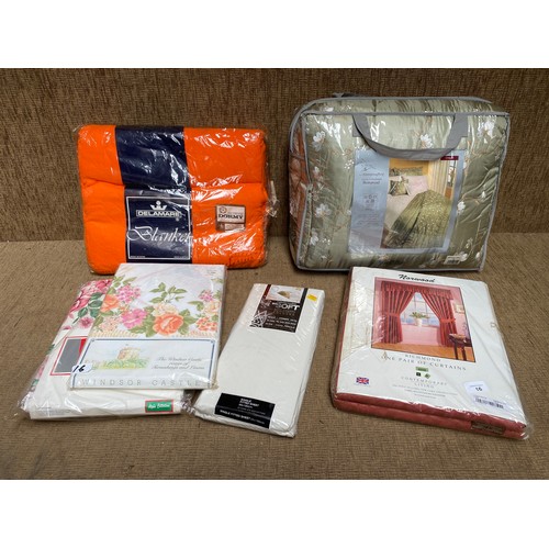 16 - Collection of retail packaged bedding and curtains.