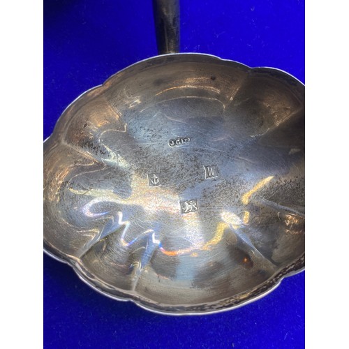 851 - Ebony and silver ladle dated Birmingham 1971.