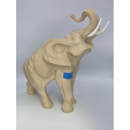 1077 - Large resin statue of an Elephant 45cm long.