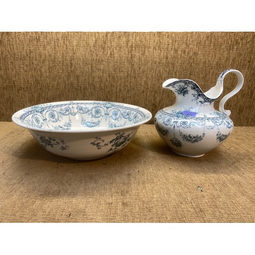 457 - Stoke-on-Trent Venre wash bowl and jug with a blue English rose chase design.