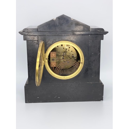 1121 - Black slate column mechanical mantle clock.