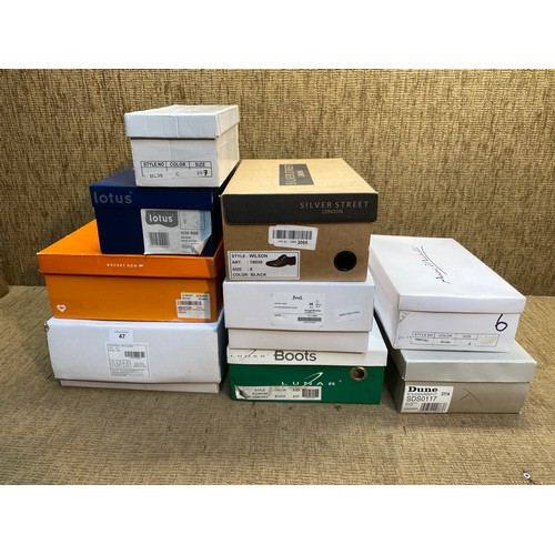 47 - 9 pairs of boxed men's shoes in various sizes.