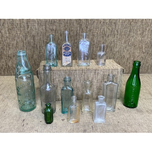 1141 - Large selection of vintage glass bottles.