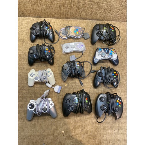 85 - Large quantity of Xbox controllers.