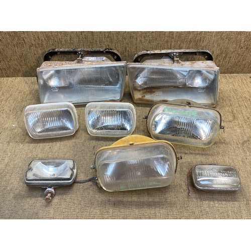 92 - Three pairs of vintage car front lights including Chevette.