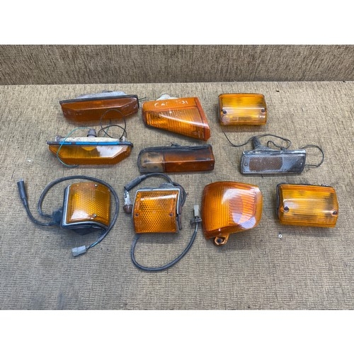 94 - Five pairs of vintage car indicator lights mostly Ford including Ford Escort MK3