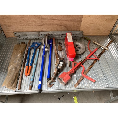 113 - Selection of pipe bending tools, welding rods and 30 lengths of galvanised steel.