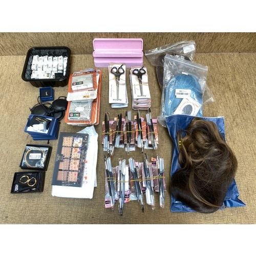 121 - Mixed retail packaged items including make-up kits, costume jewellery and wigs.