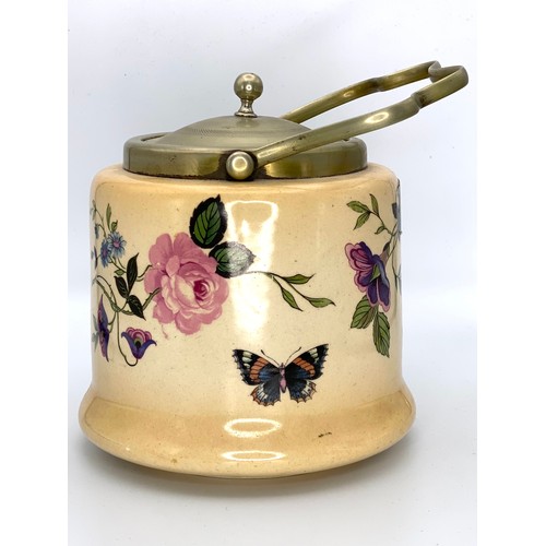 674 - Floral biscuits barrel by Bristola pottery with butterflies.