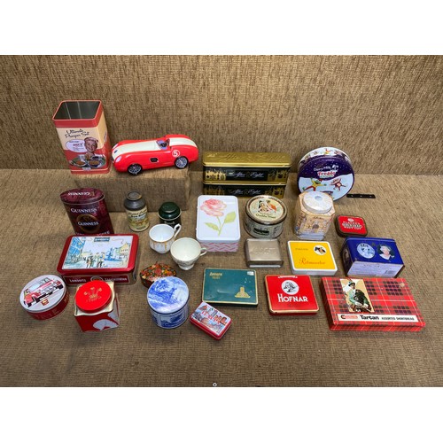 503 - Selection of collectable tins including Guinness and Famous Grouse.