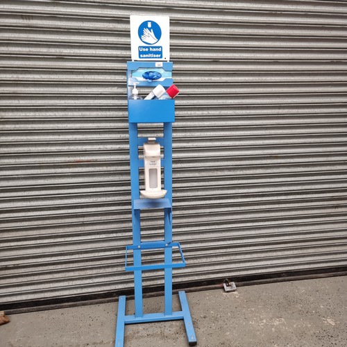 289 - Tall standing sanitizing station.