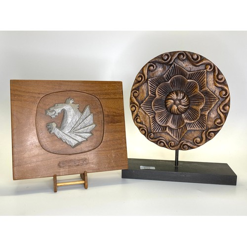 695 - A Wooden Tudor rose plaque on a wooden base 23cm tall and a Welsh dragon plaque.