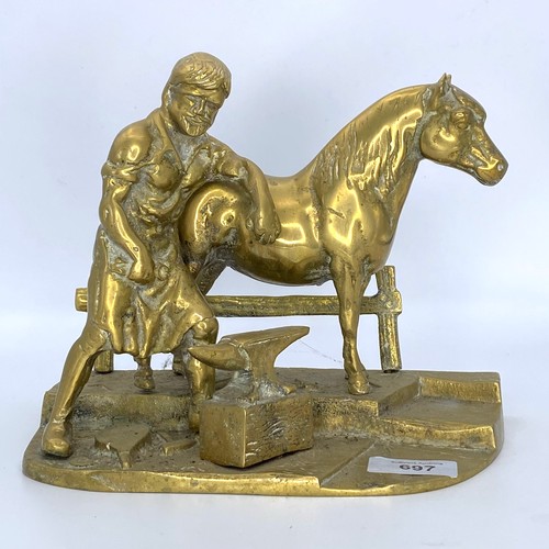 697 - Large brass statue of a black-Smith with his horse.