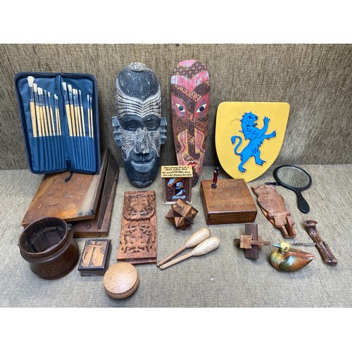 522 - Selection of mixed treen items including an African mask a set of artists paint brushes and a dragon... 