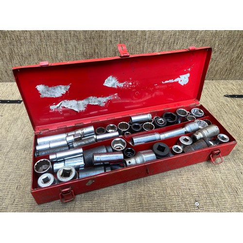 329 - Red tool box containing metric heavy duty sockets and impact drivers.