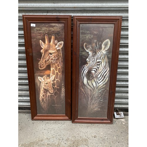 333 - Two large framed animal prints signed Ruane Manning 103cm x 43cm.