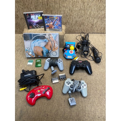 1207A - PlayStation 1 console and accessories.