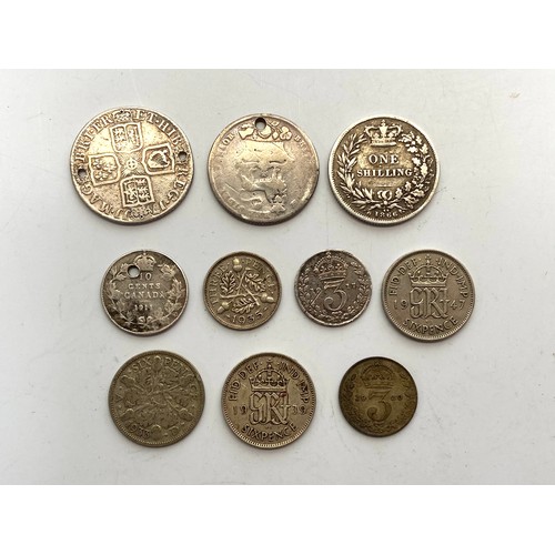 898 - Collection of silver cons including a 1707 Queen Anne 1826  Shilling and a 1866 shilling.