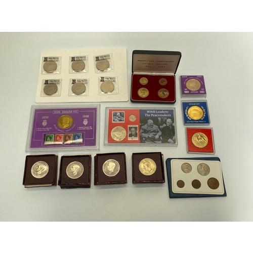 899 - Collection of boxed coins including Festival of Britain, 22ct Plated Edinburgh castle, Lundy Island,... 