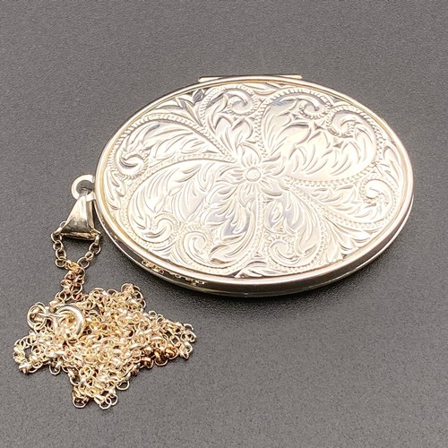 906 - Large silver locket (2 inch).