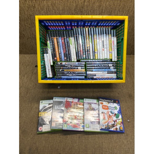 24 - Large quantity of 50 Xbox and Xbox 360 games including Driver, Halo and Raw 2.