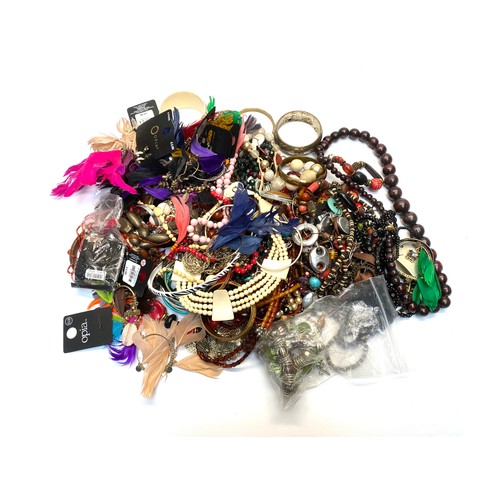 457 - 3kg of mixed costume jewellery.