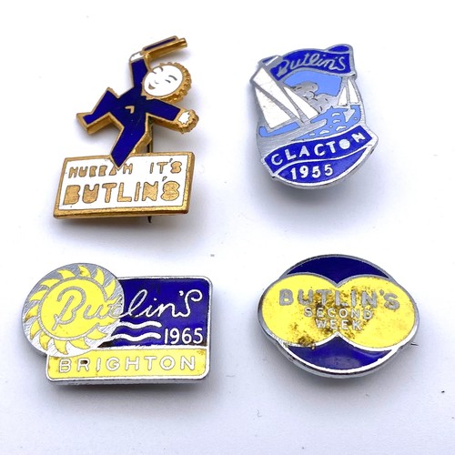 460 - Four vintage Butlins badges including Clacton, and Brighton.