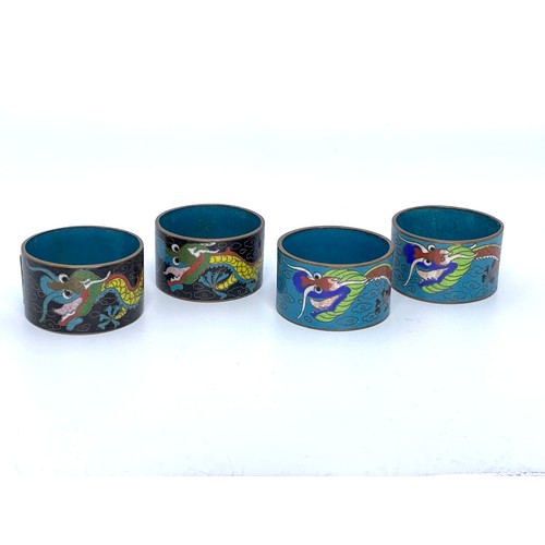 657 - Two pairs of Cloisonné napkin rings.