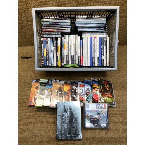 61 - Large collection of PS2 and PSP games.