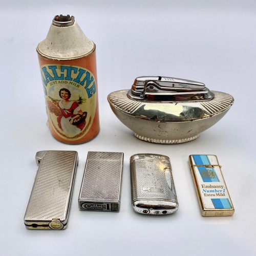 668 - Collection of vintage lighters including cricket oval team lighter and a Ronson table lighter.