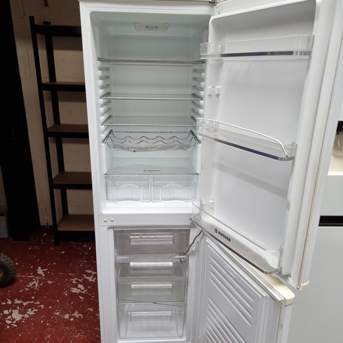 166 - Hoover Fridge freezer with Sky LED.