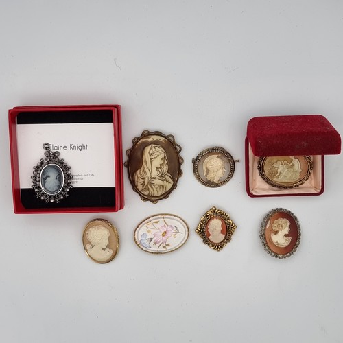 693 - 8 Vintage cameo Brooches.