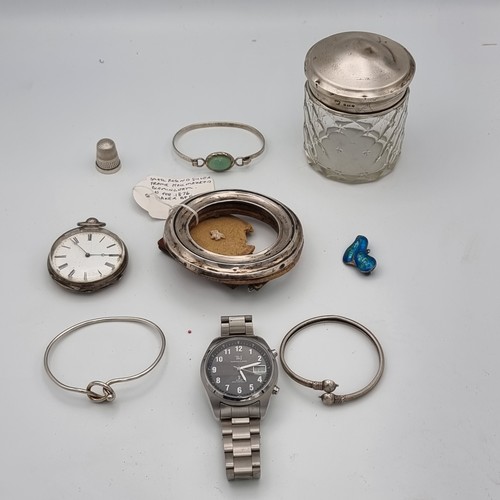 858 - Silver items including a cut Glass and silver topped dressing table pot and a small silver photo fra... 