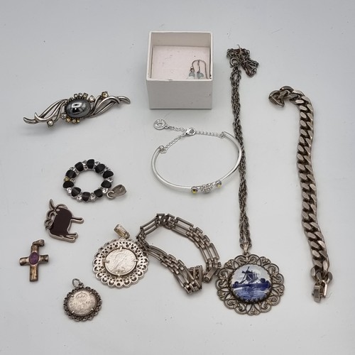 506 - Collection of silver and white metal vintage costume jewellery.