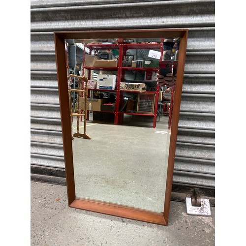 278 - Framed bevel edged mirror 71cm x 43cm.