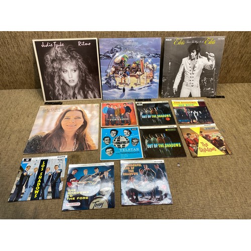 1240 - A collection of vinyl  records and 45s  including The beach boys, Elvis and Judy Collins.