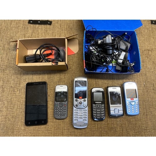 1254 - Vodaphone Smart turbo 7 phone in its box and 5 other phones with chargers.