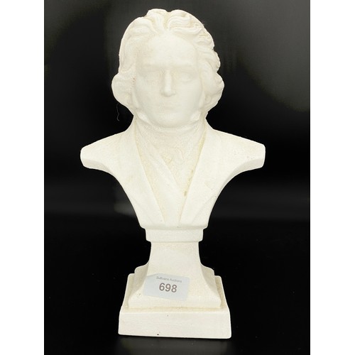 698 - Plaster head busts of Motzart 33cm tall.